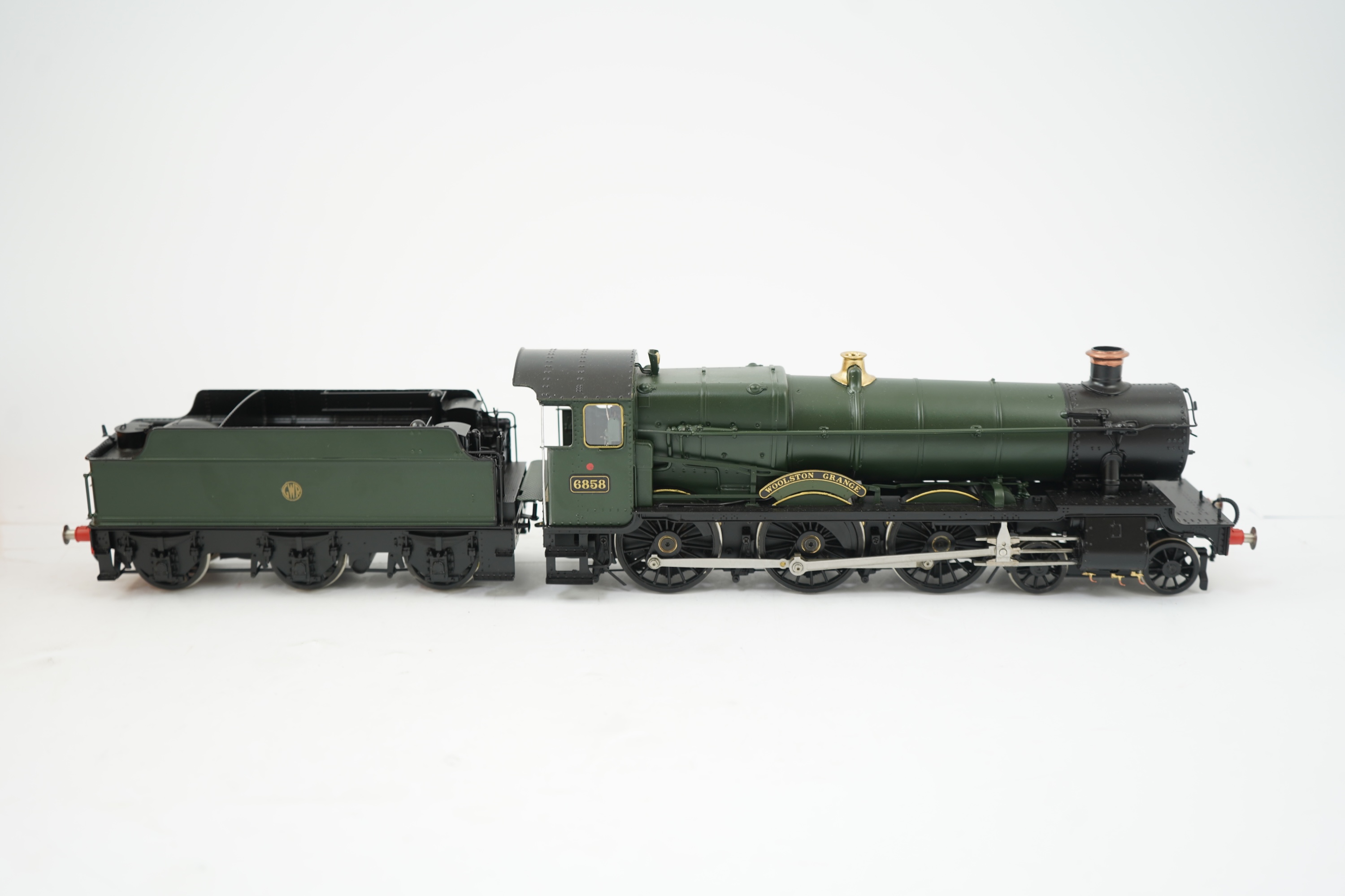 An 0 gauge Finescale Brass (by SanCheng, China) model of GWR Grange Class, Woolston Grange, 6858, 4-6-0 tender locomotive, powered for two rail operation, with original box.